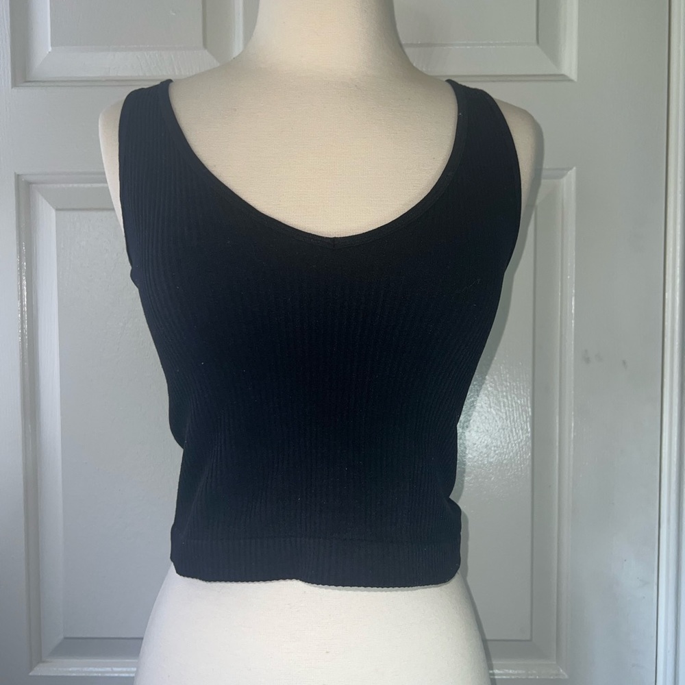 3 pack of tank tops (brown/orange, black, and white)